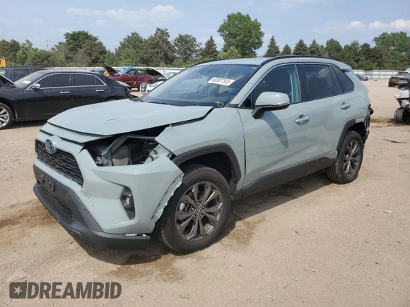 2022 Toyota RAV4 Hybrid XLE Premium with VIN 4T3B6RFV8NU101319, listed as a Copart auction lot 60987535 with 100,070 mi miles and Salvage title. Bid and sale history available at DreamBid. Image 1.