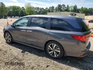 2024 Honda Odyssey Touring with VIN 5FNRL6H8XRB039009, listed as a Copart auction lot 56136305 with Not provided miles and Salvage title. Bid and sale history available at DreamBid. Image 2.