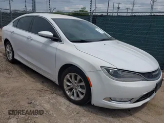2015 Chrysler 200 C with VIN 1C3CCCCGXFN631935, listed as a IAAI auction lot 42144521 with 157,531 mi miles. Bid and sale history available at carsss.com. Image 1.