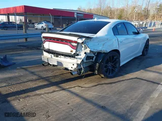 2020 Dodge Charger Scat Pack Widebody with VIN 2C3CDXGJ3LH244092, listed as a IAAI auction lot 41828294 with 107,568 mi miles. Bid and sale history available at carsss.com. Image 4.