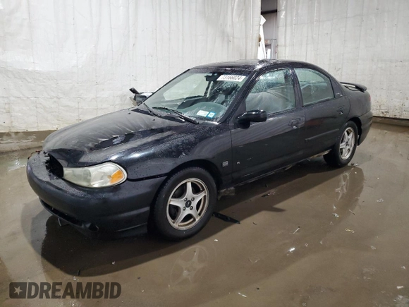 1998 Ford Contour z VIN 1FAFP68GXWK272570, wystawiony jako Copart lot #73166024 z przebiegiem 315 249 mil mil oraz Szkoda całkowita • Salvage title. Historia ofert i sprzedaży dostępna na DreamBid. Obrazek 1.