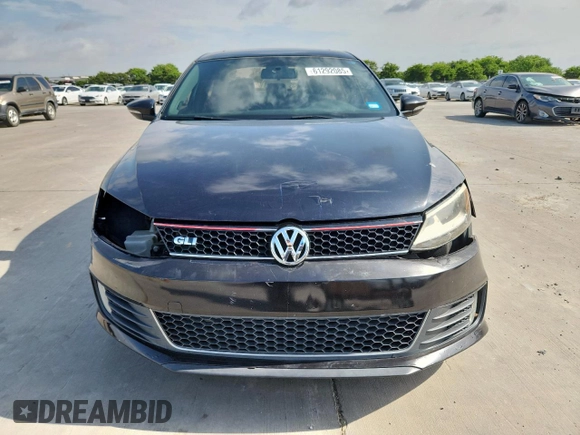 2014 Volkswagen Jetta GLI Edition 30 z VIN 3VW4S7AJ1EM390796, wystawiony jako Copart lot #61292085 z przebiegiem 138 224 mil mil oraz Czysty tytuł • Clean title. Historia ofert i sprzedaży dostępna na DreamBid. Obrazek 5.