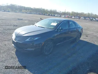 2014 Lincoln MKZ z VIN 3LN6L2J97ER835137, wystawiony jako IAAI lot #42062405 z przebiegiem 281 924 mil mil oraz . Historia ofert i sprzedaży dostępna na DreamBid. Obrazek 2.