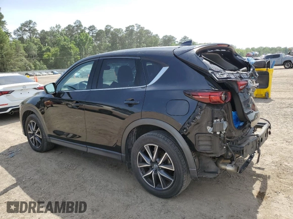 2018 Mazda CX-5 Grand Touring z VIN JM3KFADM2J1381752, wystawiony jako Copart lot #56889835 z przebiegiem 96 820 mil mil oraz Szkoda całkowita • Salvage title. Historia ofert i sprzedaży dostępna na DreamBid. Obrazek 2.