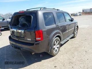 2012 Honda Pilot Touring with VIN 5FNYF4H99CB069996, listed as a IAAI auction lot 41809046 with 140,836 mi miles and . Bid and sale history available at DreamBid. Image 4.