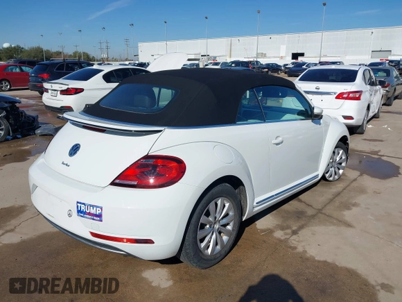 2019 Volkswagen Beetle S with VIN 3VW5DAAT0KM507437, listed as a IAAI auction lot 41380821 with 28,010 mi miles and . Bid and sale history available at DreamBid. Image 4.