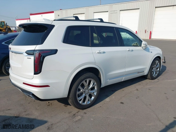2020 Cadillac XT6 AWD Sport with VIN 1GYKPGRS5LZ115883, listed as a IAAI auction lot 39995097 with 68,589 mi miles. Bid and sale history available at carsss.com. Image 4.