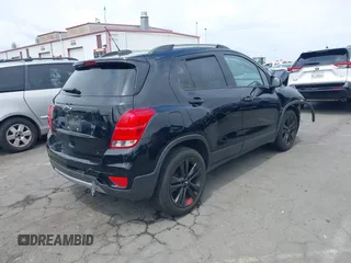2020 Chevrolet Trax LT with VIN 3GNCJLSB8LL221077, listed as a IAAI auction lot 42421378 with 97,372 mi miles and . Bid and sale history available at DreamBid. Image 4.