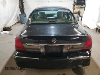2010 Mercury Grand Marquis LS z VIN 2MEBM7FV6AX628705, wystawiony jako Copart lot #52185105 z przebiegiem 139 485 mil mil oraz Szkody całkowita. Historia ofert i sprzedaży dostępna na DreamBid. Obrazek 6.