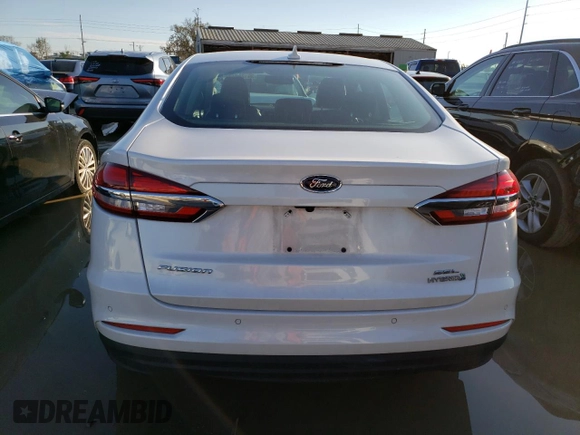 2019 Ford Fusion Hybrid SEL with VIN 3FA6P0MU0KR214689, listed as a Copart auction lot 39128013 with 51,443 mi miles. Bid and sale history available at carsss.com. Image 6.