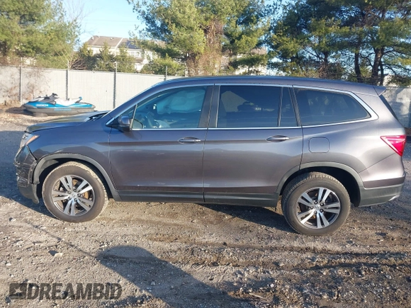 2017 Honda Pilot EX-L z VIN 5FNYF6H70HB069712, wystawiony jako IAAI lot #41828893 z przebiegiem 70 061 mil mil oraz . Historia ofert i sprzedaży dostępna na DreamBid. Obrazek 14.