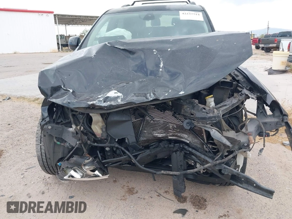 2013 Dodge Durango Crew with VIN 1C4RDHDG1DC647447, listed as a IAAI auction lot 42237714 with 177,523 mi miles and . Bid and sale history available at DreamBid. Image 6.