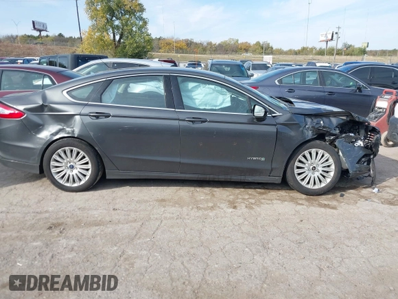 2015 Ford Fusion SE Hybrid with VIN 3FA6P0LUXFR266743, listed as a IAAI auction lot 40862039 with 116,610 mi miles. Bid and sale history available at carsss.com. Image 13.