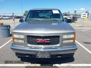 1999 GMC Suburban with VIN 3GKFK16R0XG511301, listed as a IAAI auction lot 41946753 with 231,650 mi miles and . Bid and sale history available at DreamBid. Image 12.