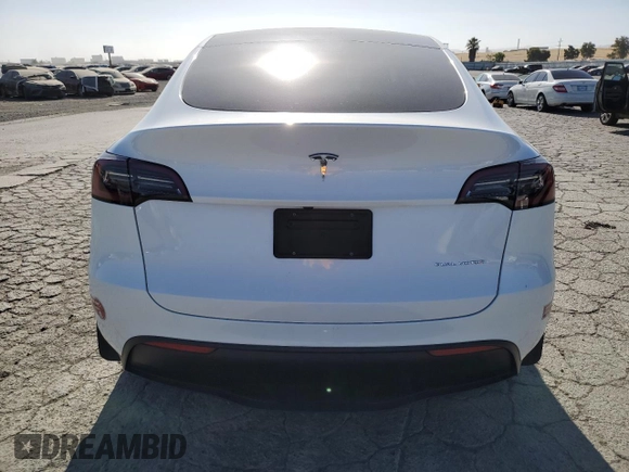 2024 Tesla Model Y Long Range с VIN 7SAYGDEE8RF983067, выставлен на аукционе Copart как лот 61217015 с пробегом 57 082 миль миль и Списание • Salvage title. История ставок и продаж доступна на DreamBid. Изображение 6.