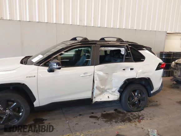 2021 Toyota RAV4 Hybrid XSE with VIN 4T3E6RFV8MU046348, listed as a IAAI auction lot 40520896 with 53,312 mi miles and . Bid and sale history available at DreamBid. Image 6.