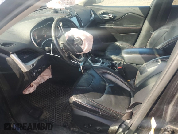 2014 Jeep Cherokee Trailhawk with VIN 1C4PJMBS3EW127928, listed as a Copart auction lot 63825865 with 172,712 mi miles and Salvage title. Bid and sale history available at DreamBid. Image 7.