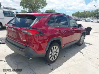 2021 Toyota RAV4 XLE Premium with VIN JTMC1RFV2MD080837, listed as a IAAI auction lot 42049997 with 25,823 mi miles. Bid and sale history available at carsss.com. Image 4.