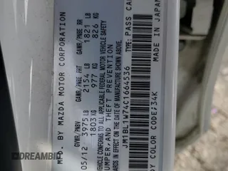 2012 Mazda 3 i Grand Touring with VIN JM1BL1W74C1664536, listed as a Copart auction lot 82973564 with 121,758 mi miles and Salvage Title. Bid and sale history available at carsss.com. Image 14.