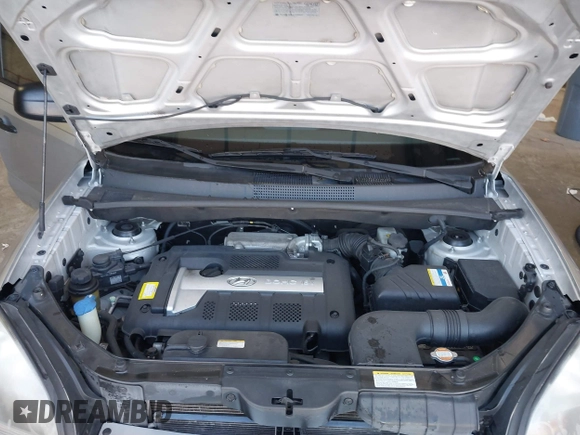 2007 Hyundai Tucson GLS with VIN KM8JM12B07U567384, listed as a IAAI auction lot 41779454 with 152,660 mi miles. Bid and sale history available at carsss.com. Image 9.