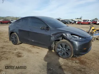 2024 Tesla Model Y with VIN 7SAYGDED5RF105278, listed as a Copart auction lot 44376125 with 12,693 mi miles and Salvage Title. Bid and sale history available at DreamBid. Image 4.