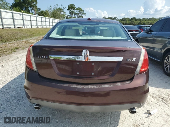 2009 Lincoln MKS with VIN 1LNHM93R19G631250, listed as a Copart auction lot 55442505 with 160,926 mi miles and Salvage Title. Bid and sale history available at DreamBid. Image 6.