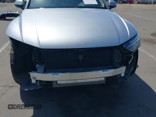 2021 Audi Q5 Premium Plus z VIN WA1BAAFY6M2130653, wystawiony jako IAAI lot #42138199 z przebiegiem 42 127 mil mil oraz . Historia ofert i sprzedaży dostępna na DreamBid. Obrazek 6.