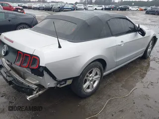 2013 Ford Mustang V6 with VIN 1ZVBP8EM4D5217006, listed as a IAAI auction lot 41560921 with 95,877 mi miles and . Bid and sale history available at DreamBid. Image 4.