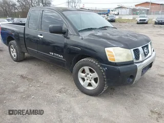 2006 Nissan Titan SE with VIN 1N6BA06A86N570617, listed as a IAAI auction lot 41613217 with 211,095 mi miles and . Bid and sale history available at DreamBid. Image 1.