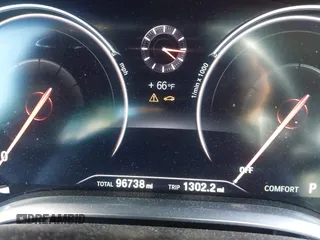 2018 BMW 7 Series 740i with VIN WBA7E2C55JB214987, listed as a IAAI auction lot 41733790 with 96,738 mi miles. Bid and sale history available at carsss.com. Image 7.