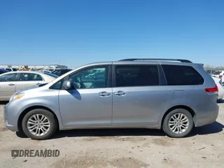 2011 Toyota Sienna XLE AAS with VIN 5TDYK3DCXBS172586, listed as a IAAI auction lot 41835992 with 203,599 mi miles. Bid and sale history available at carsss.com. Image 14.
