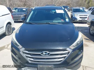 2017 Hyundai Tucson Value with VIN KM8J33A28HU302472, listed as a IAAI auction lot 41717598 with 126,438 mi miles. Bid and sale history available at carsss.com. Image 12.
