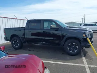 2019 Ram 1500 Rebel with VIN 1C6SRFLT2KN592652, listed as a IAAI auction lot 41989054 with 71,630 mi miles and . Bid and sale history available at DreamBid. Image 13.