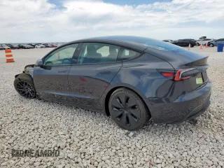 2025 Tesla Model 3 Long Range z VIN 5YJ3E1EA5SF000814, wystawiony jako Copart lot #57821595 z przebiegiem 727 mil mil oraz Szkoda całkowita • Salvage title. Historia ofert i sprzedaży dostępna na DreamBid. Obrazek 2.