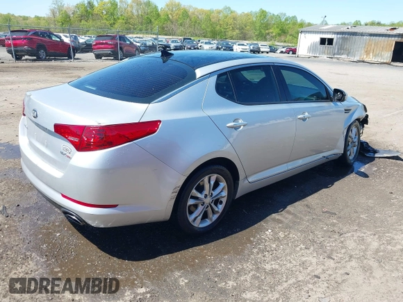 2013 Kia Optima EX with VIN 5XXGN4A73DG108068, listed as a IAAI auction lot 42059774 with 210,179 mi miles and . Bid and sale history available at carsss.com. Image 4.