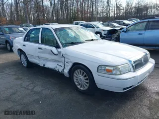 2009 Mercury Grand Marquis LS with VIN 2MEHM75V99X604731, listed as a IAAI auction lot 41732724 with 111,608 mi miles. Bid and sale history available at carsss.com. Image 1.