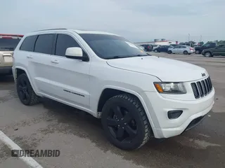 2015 Jeep Grand Cherokee Altitude z VIN 1C4RJFAG7FC150276, wystawiony jako IAAI lot #42406560 z przebiegiem 131 147 mil mil oraz . Historia ofert i sprzedaży dostępna na DreamBid. Obrazek 1.