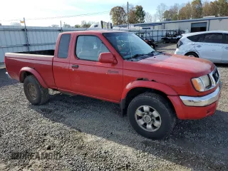 1999 Nissan Frontier XE with VIN 1N6ED26Y8XC342224, listed as a Copart auction lot 79815914 with 227,533 mi miles and Salvage title. Bid and sale history available at DreamBid. Image 4.