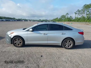 2016 Hyundai Sonata SE z VIN 5NPE24AF8GH350287, wystawiony jako IAAI lot #42476022 z przebiegiem 185 630 mil mil oraz . Historia ofert i sprzedaży dostępna na DreamBid. Obrazek 14.