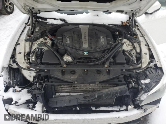 2015 BMW 5 Series 550i with VIN WBAKN9C55FD960970, listed as a Copart auction lot 84994434 with 105,593 mi miles and Salvage title. Bid and sale history available at DreamBid. Image 11.