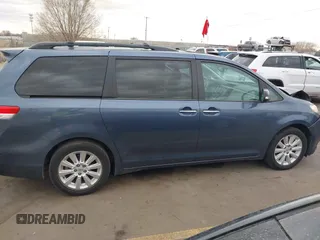 2013 Toyota Sienna XLE with VIN 5TDDK3DC1DS062849, listed as a IAAI auction lot 41510296 with 100,178 mi miles and . Bid and sale history available at DreamBid. Image 13.
