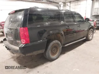 2013 GMC Yukon XL SLT z VIN 1GKS2KE78DR299361, wystawiony jako IAAI lot #41716354 z przebiegiem 283 195 mil mil oraz . Historia ofert i sprzedaży dostępna na DreamBid. Obrazek 4.