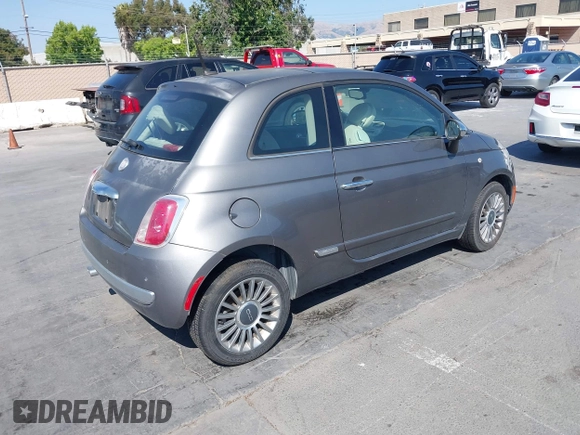 2012 FIAT 500 Lounge z VIN 3C3CFFCRXCT119565, wystawiony jako IAAI lot #42449541 z przebiegiem 93 367 mil mil oraz . Historia ofert i sprzedaży dostępna na DreamBid. Obrazek 4.