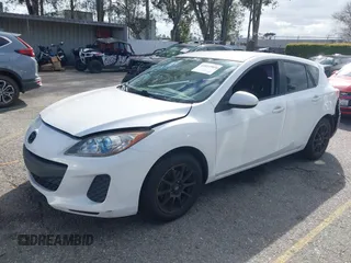 2012 Mazda Mazda3 i Touring with VIN JM1BL1L82C1695636, listed as a IAAI auction lot 41812909 with 199,314 mi miles. Bid and sale history available at carsss.com. Image 2.