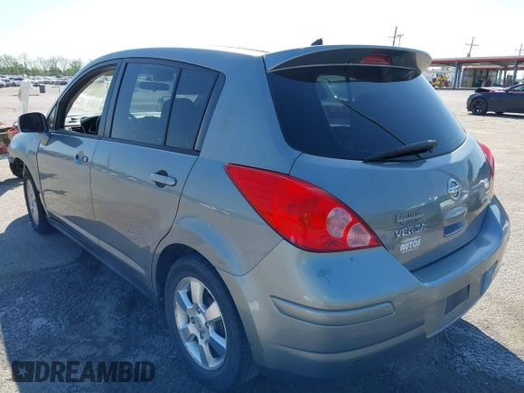 2012 Nissan Versa S with VIN 3N1BC1CP2CK279126, listed as a IAAI auction lot 42002414 with 193,567 mi miles. Bid and sale history available at carsss.com. Image 3.