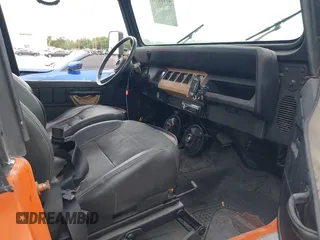 1991 Jeep Wrangler with VIN 2J4FY29SXMJ105443, listed as a IAAI auction lot 41964359 with 1,674,923 mi miles. Bid and sale history available at carsss.com. Image 5.