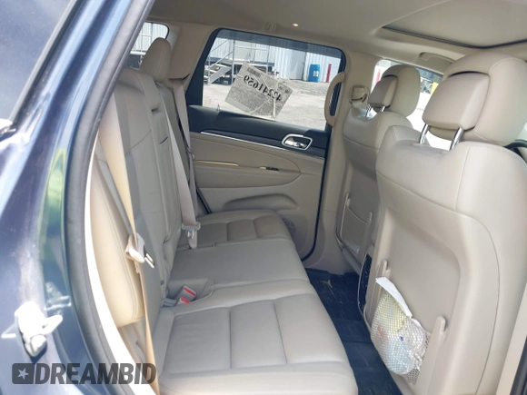 2021 Jeep Grand Cherokee 80th Anniversary with VIN 1C4RJFBGXMC775539, listed as a IAAI auction lot 42241659 with 23,541 mi miles and . Bid and sale history available at DreamBid. Image 8.