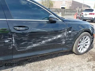 2021 Cadillac CT5 Luxury z VIN 1G6DX5RKXM0146235, wystawiony jako IAAI lot #42214676 z przebiegiem 72 847 mil mil oraz . Historia ofert i sprzedaży dostępna na DreamBid. Obrazek 19.