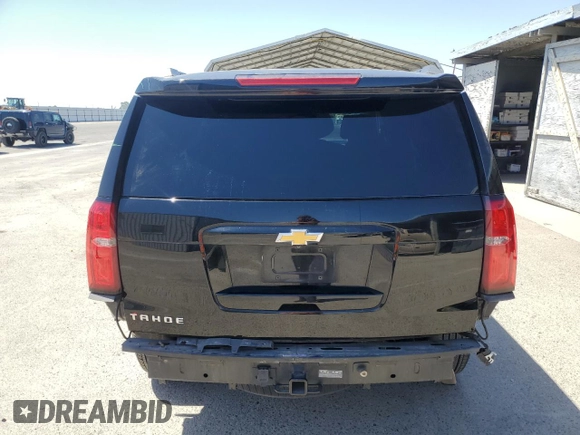 2017 Chevrolet Tahoe LS with VIN 1GNSCAEC4HR248971, listed as a Copart auction lot 58266665 with 94,377 mi miles and Salvage title. Bid and sale history available at DreamBid. Image 6.