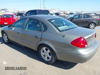 2002 Ford Taurus SES Standard with VIN 1FAFP55UX2G272540, listed as a IAAI auction lot 41874683 with 199,073 mi miles. Bid and sale history available at carsss.com. Image 3.